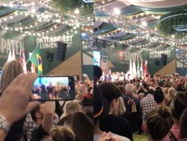 Na abertura da Oktoberfest, logo após a execução do hino nacional, algo inusitado acontece (veja o v